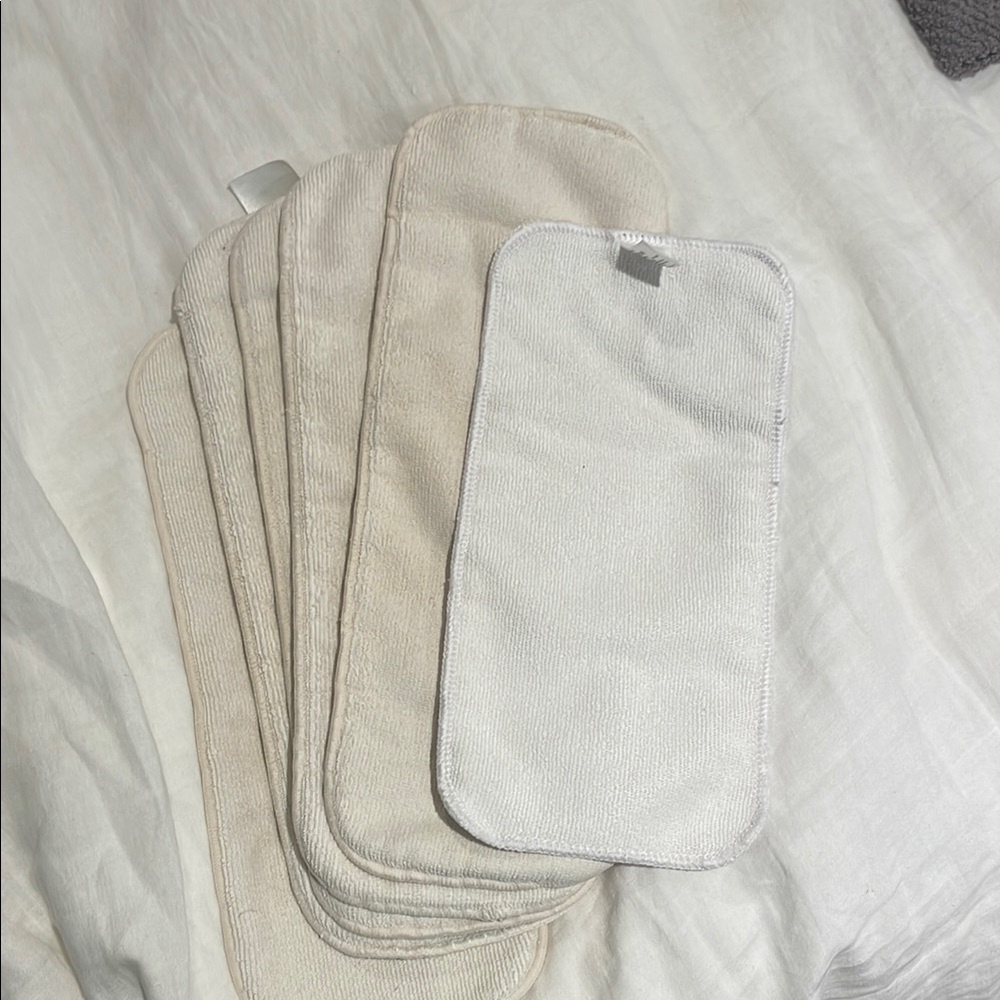 Charlie banana (5) and BumGenius (1) reusable diaper inserts